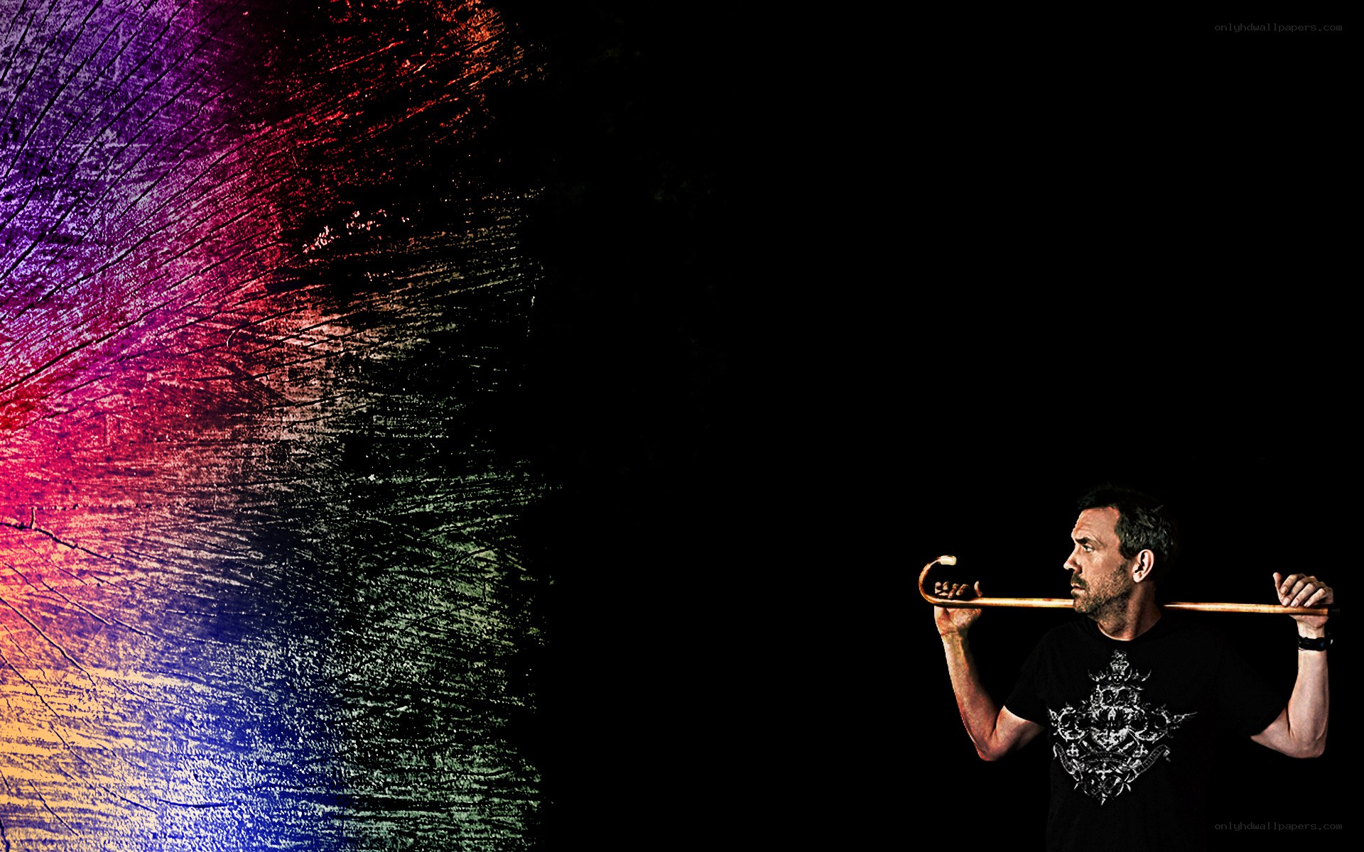 Man with cane against colorful background