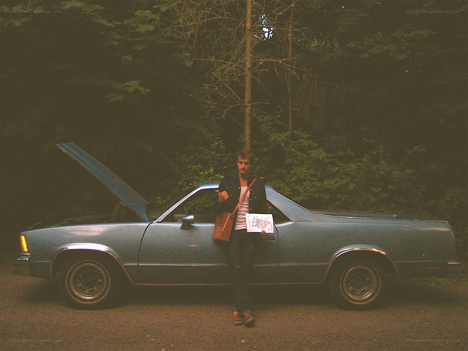 man with car and sign