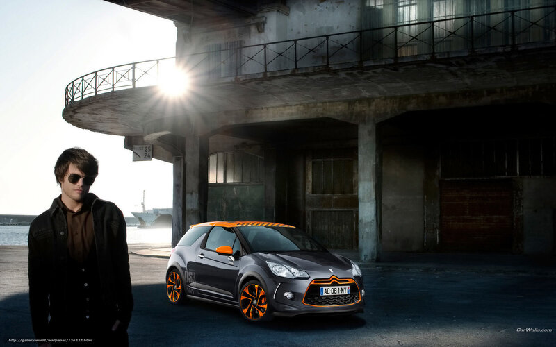 Man with car in industrial setting
