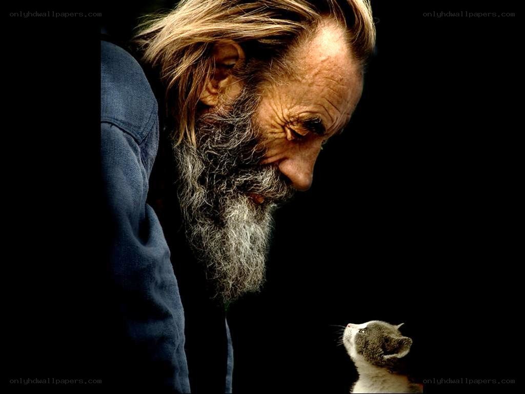 man with cat looking down