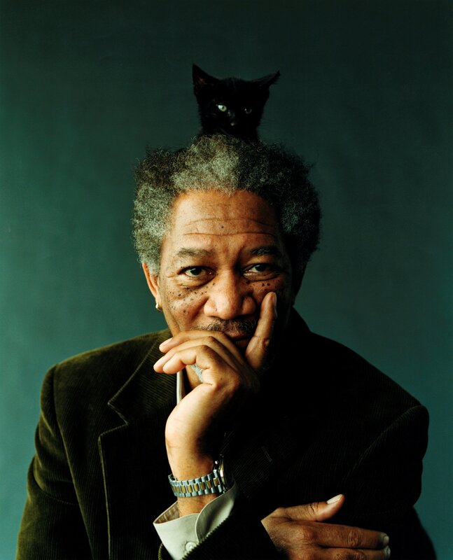 man with cat on head