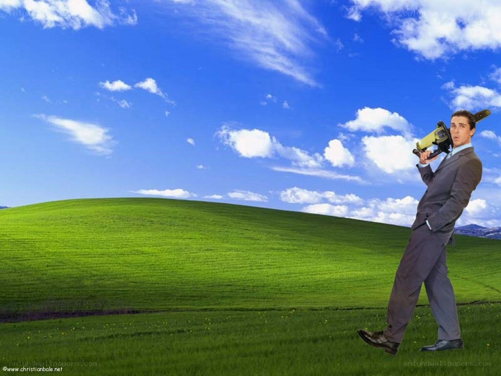 Man with chainsaw in field