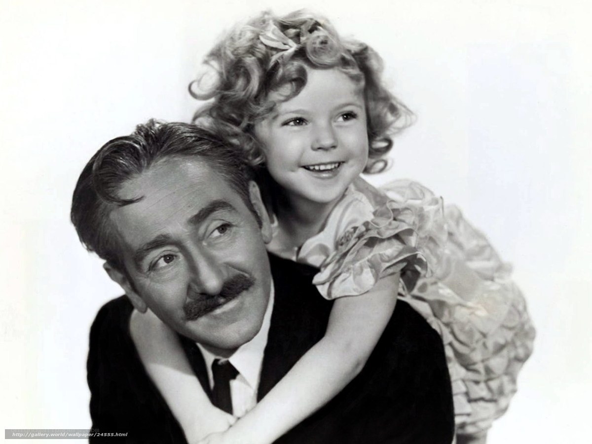 Man with child on shoulders