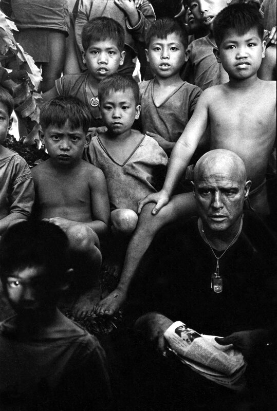 Man with children in crowd