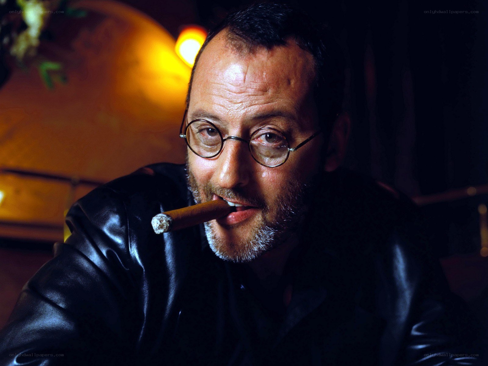man with cigar and glasses