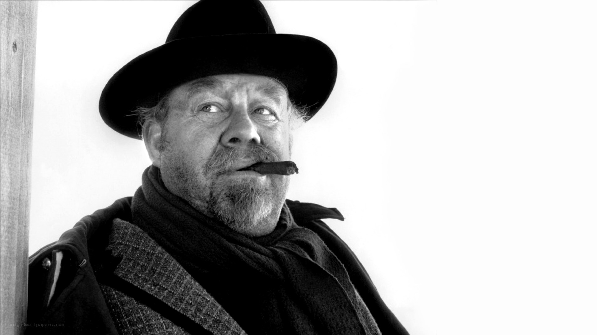 man with cigar and hat