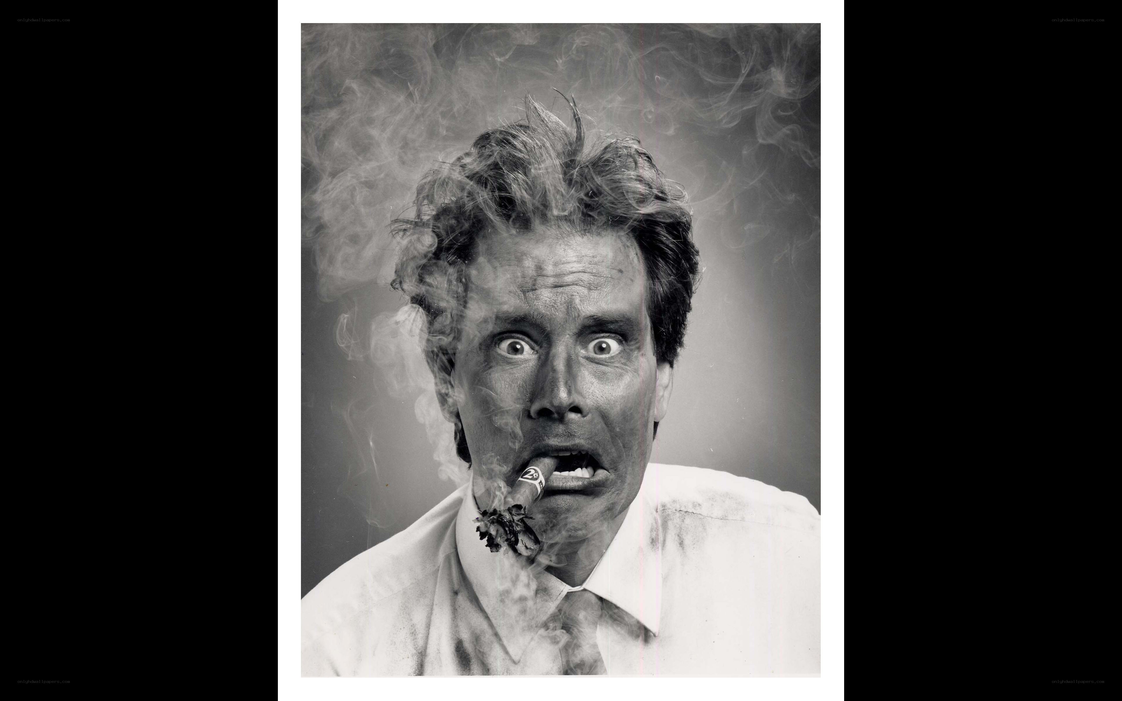 man with cigar and smoke