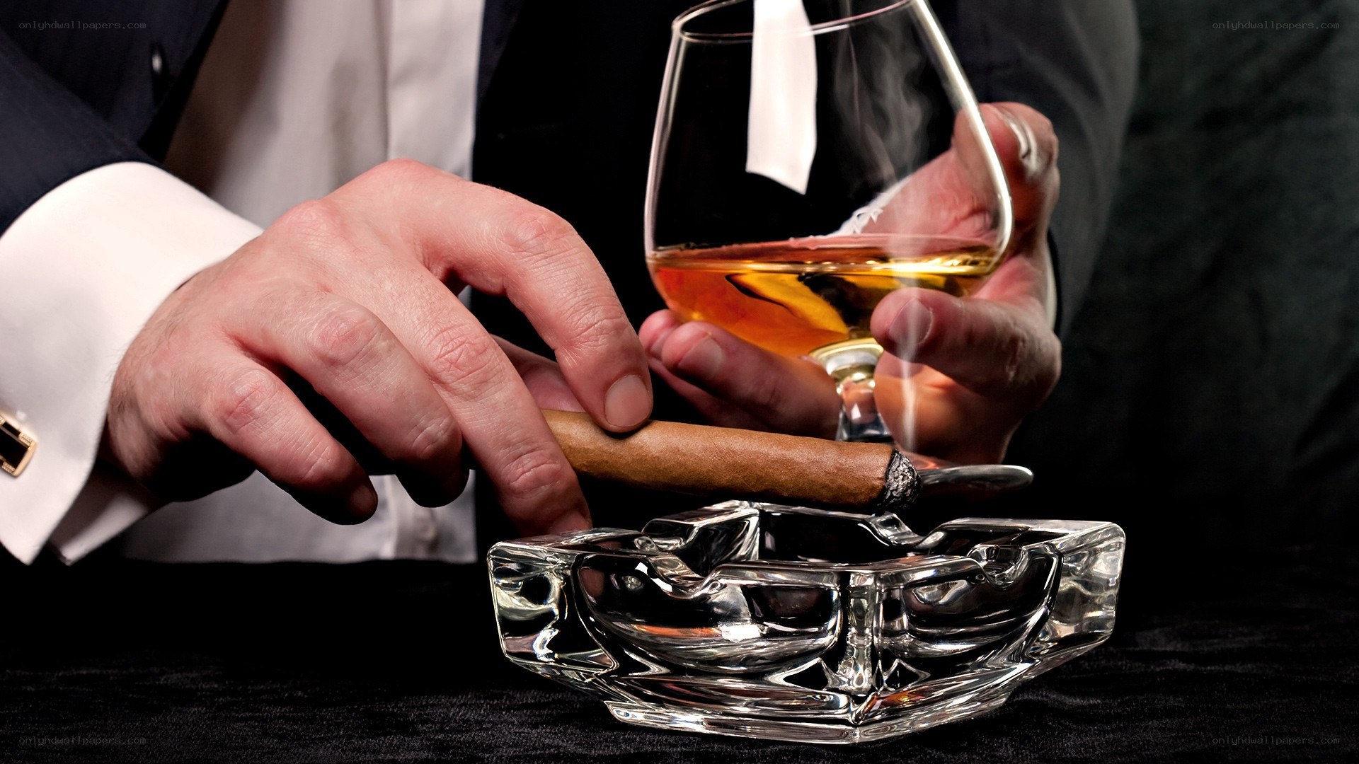 man with cigar and whiskey