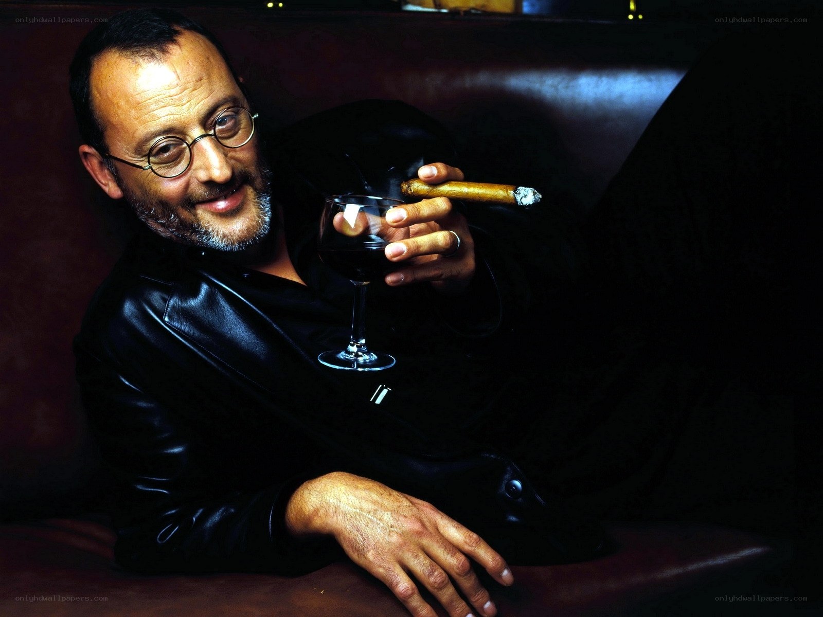 man with cigar and wine