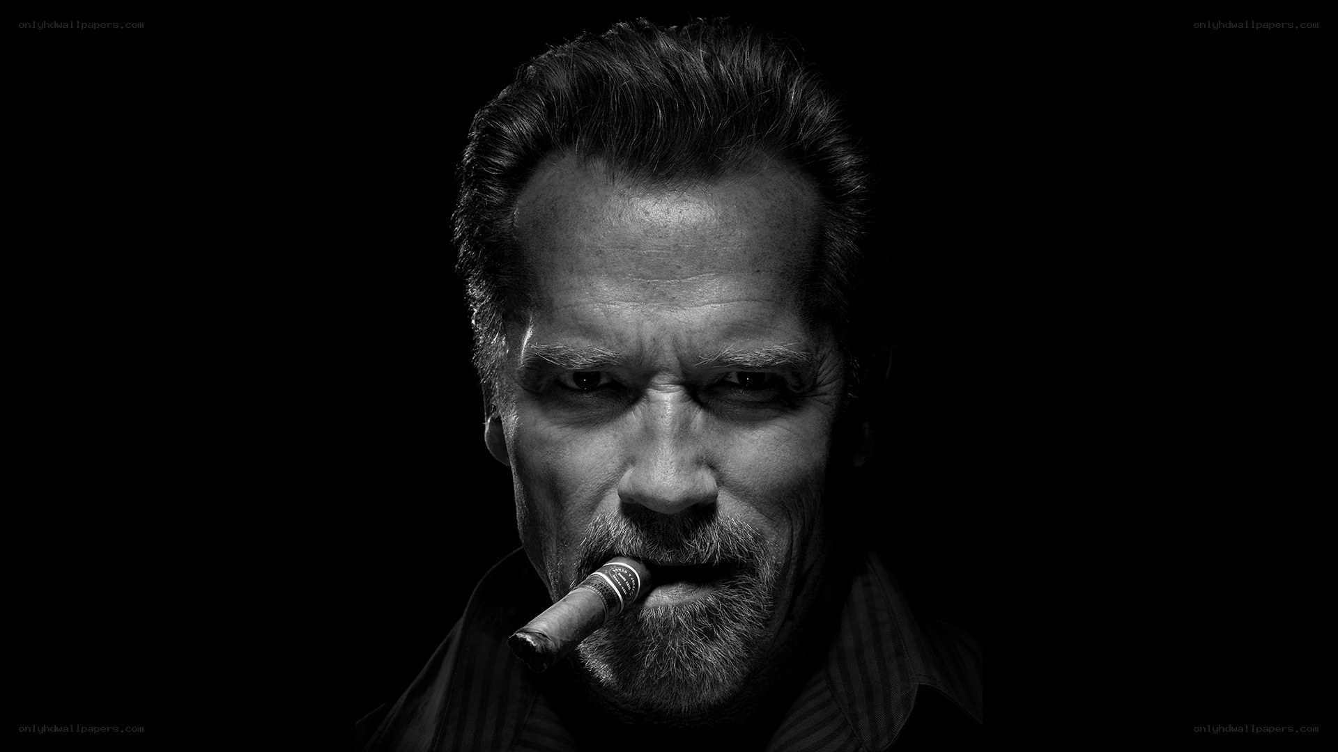 man with cigar in black and white