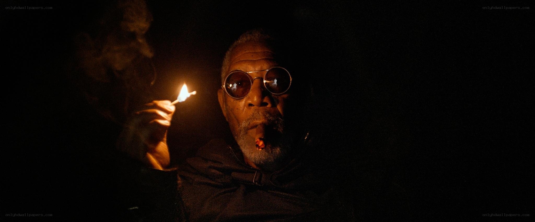 man with cigar in dark