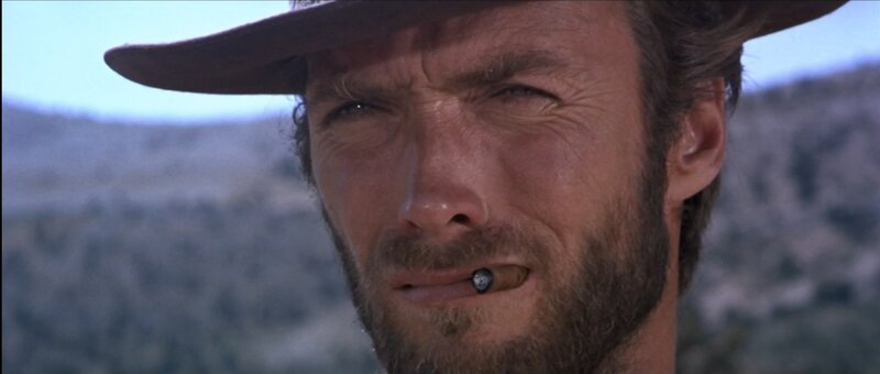 man with cigar in desert