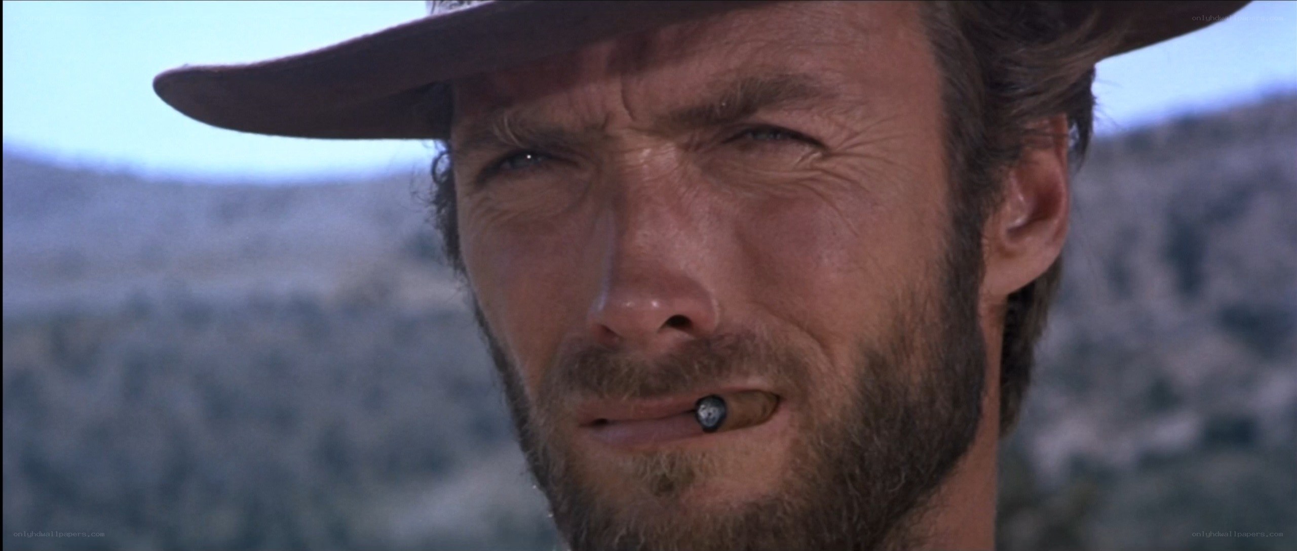 man with cigar in desert