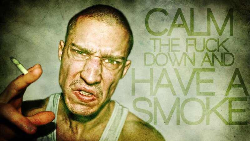 man with cigarette and angry expression