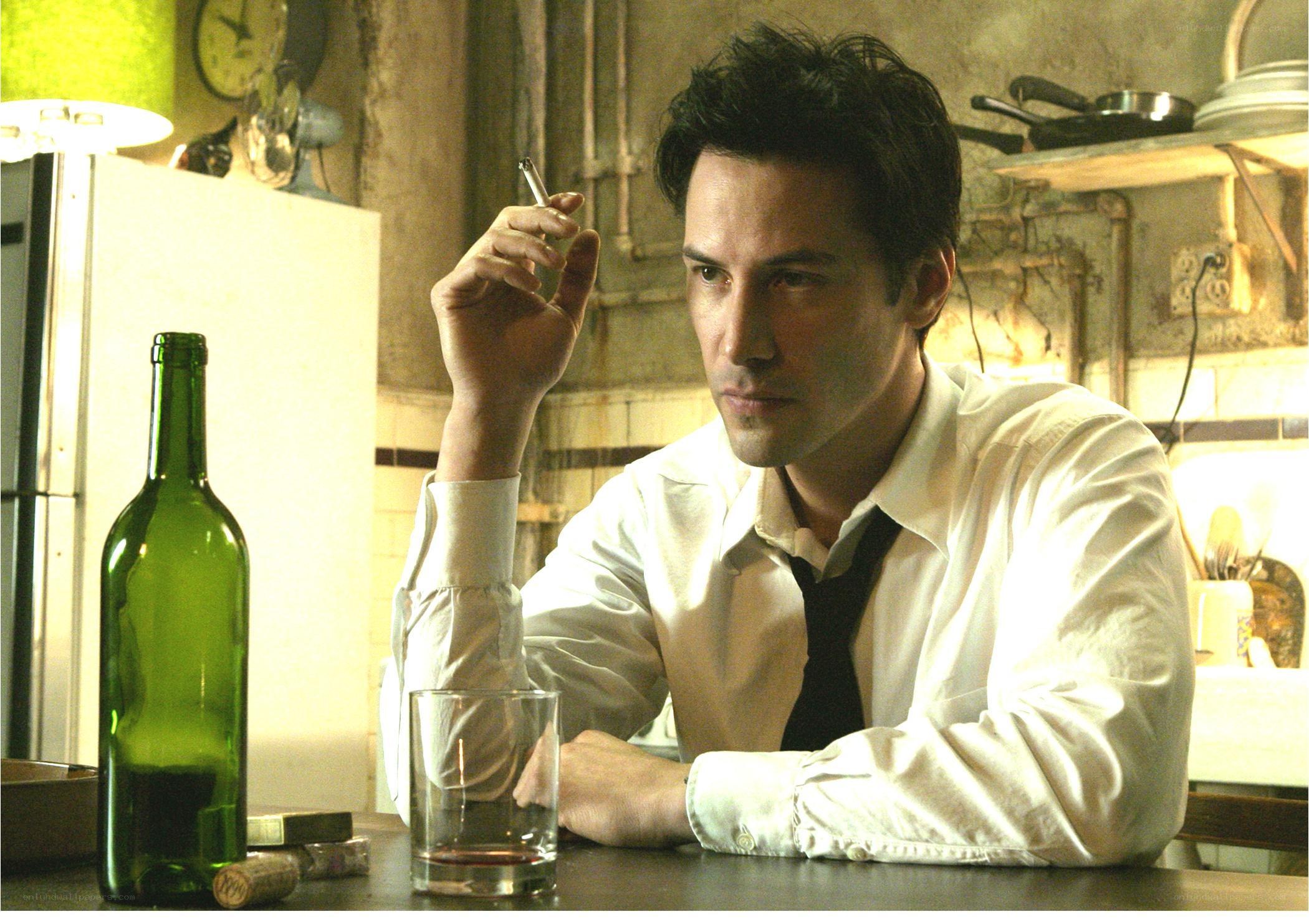 man with cigarette and drink