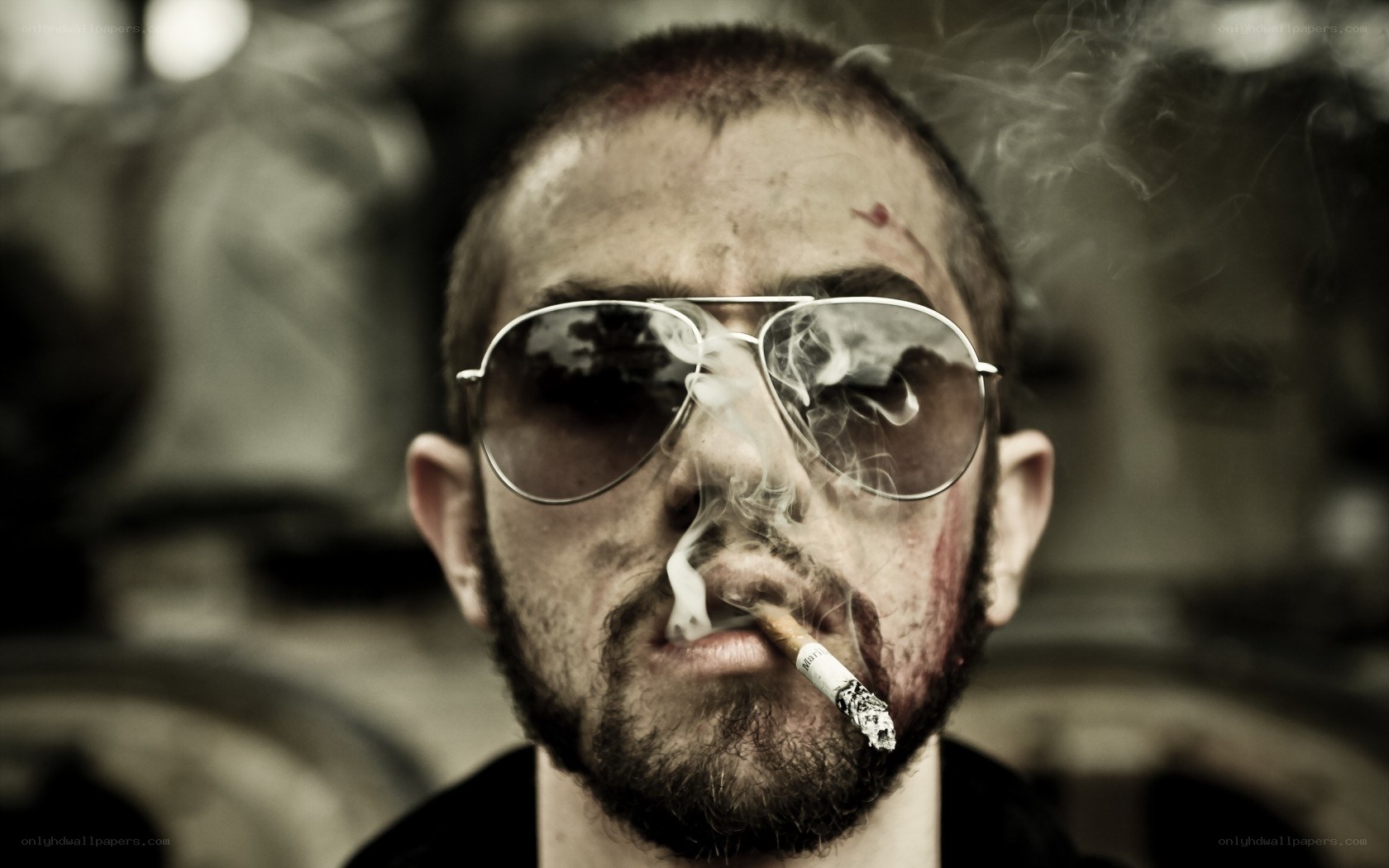 man with cigarette and sunglasses