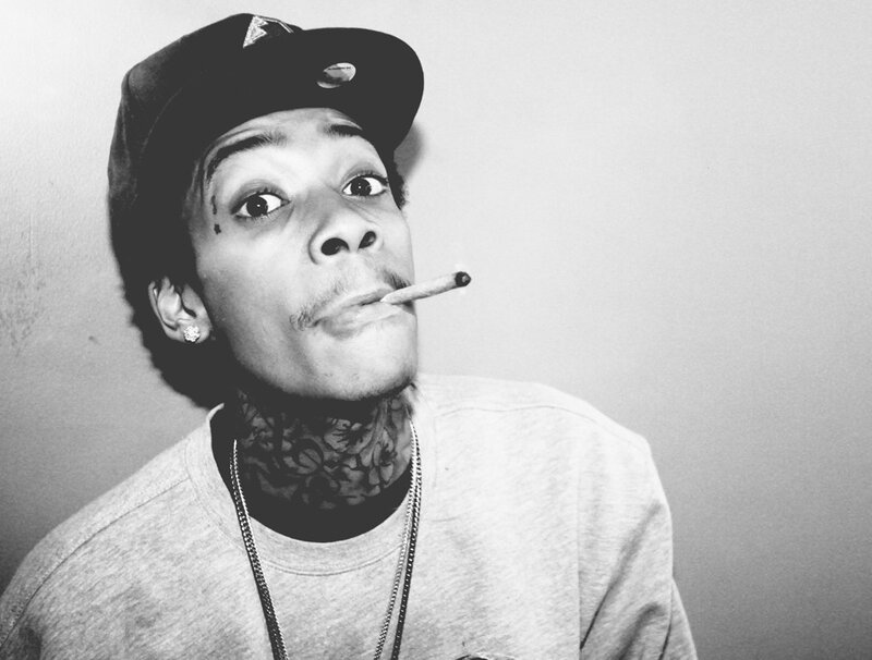 man with cigarette and tattoos
