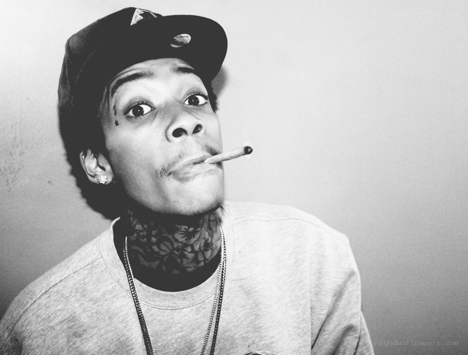 man with cigarette and tattoos