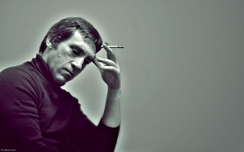 man with cigarette in hand