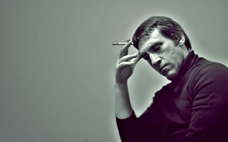 man with cigarette in hand
