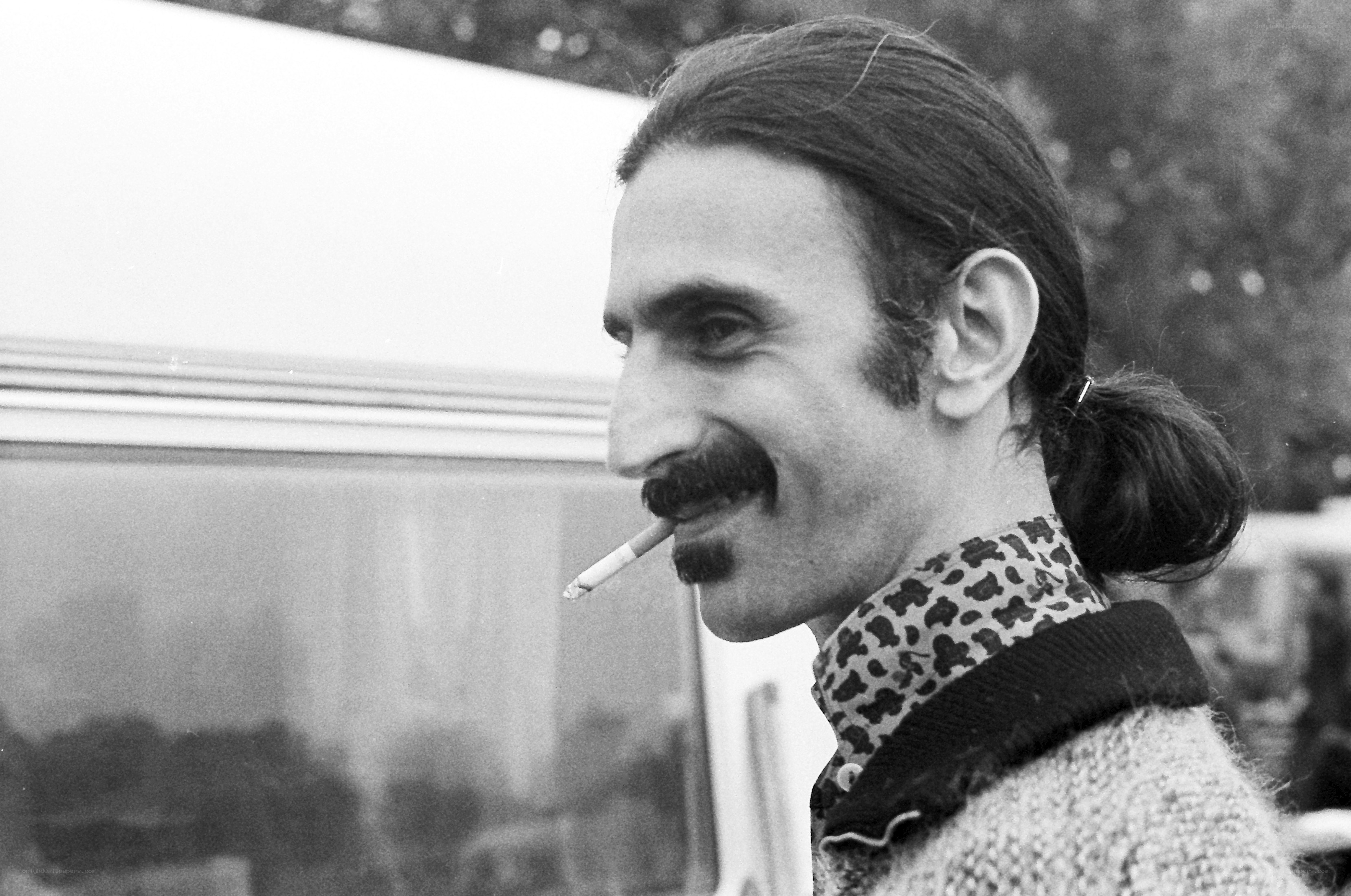 man with cigarette in profile