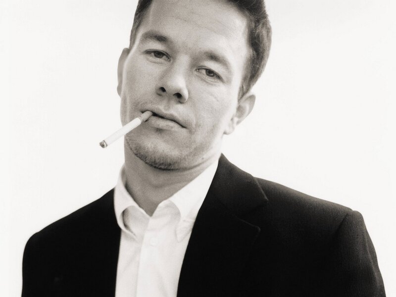 man with cigarette in suit