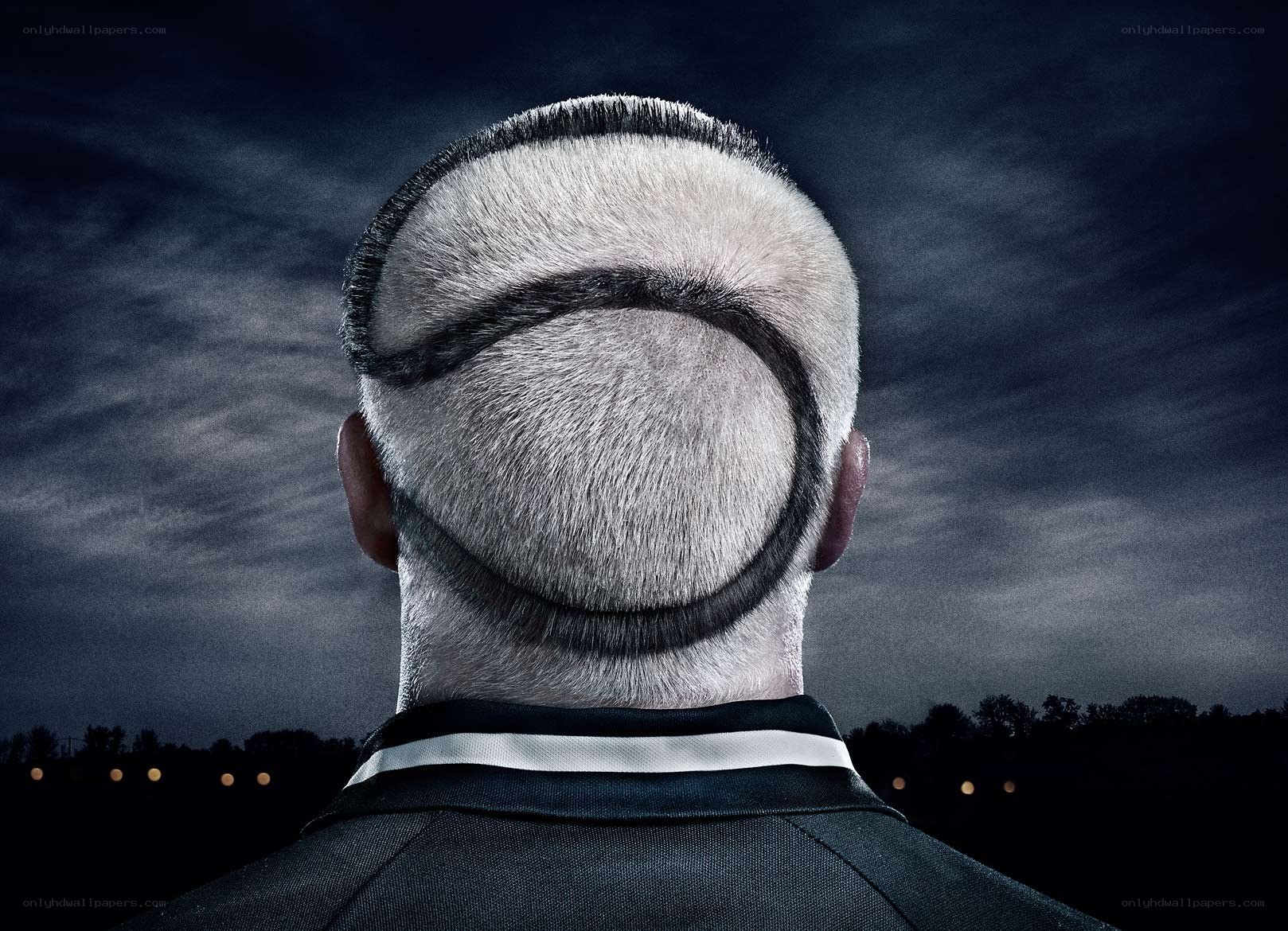 man with circular haircut