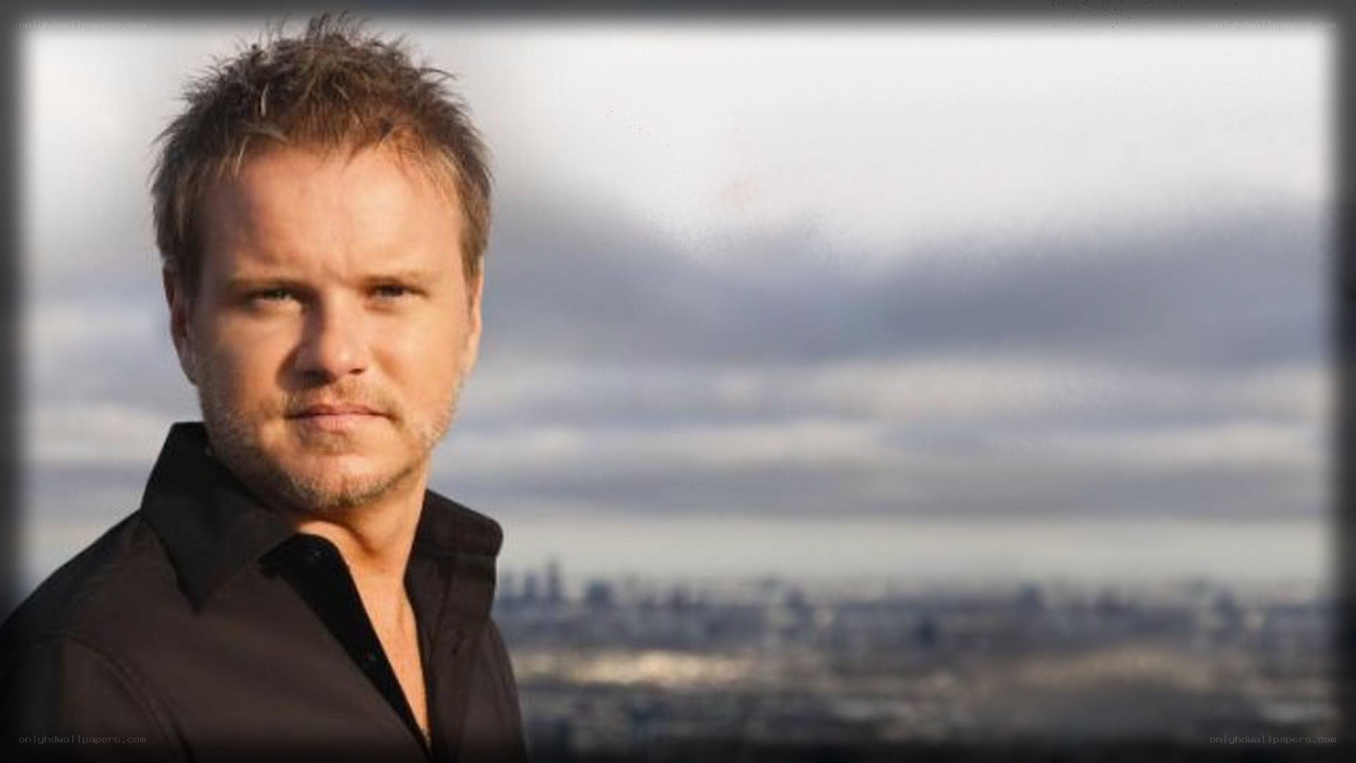 man with city skyline background