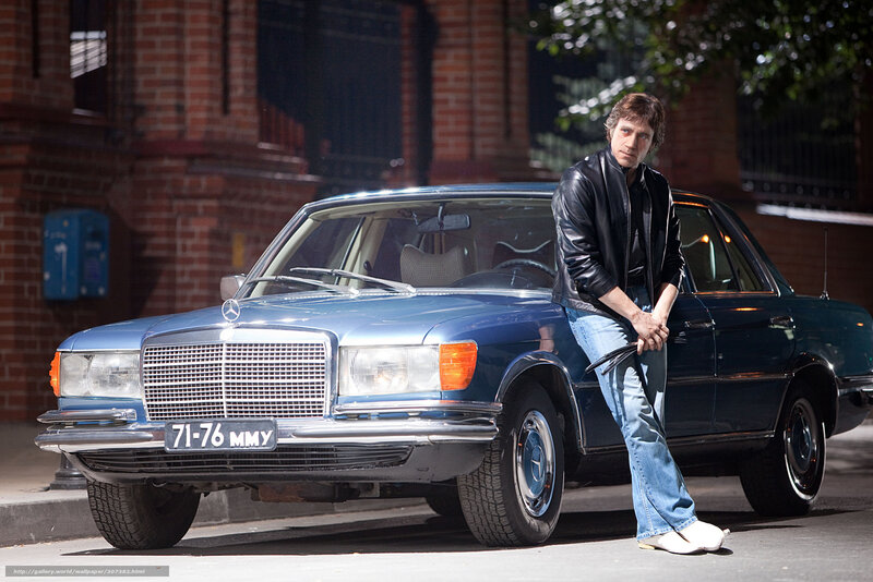 Man with classic car