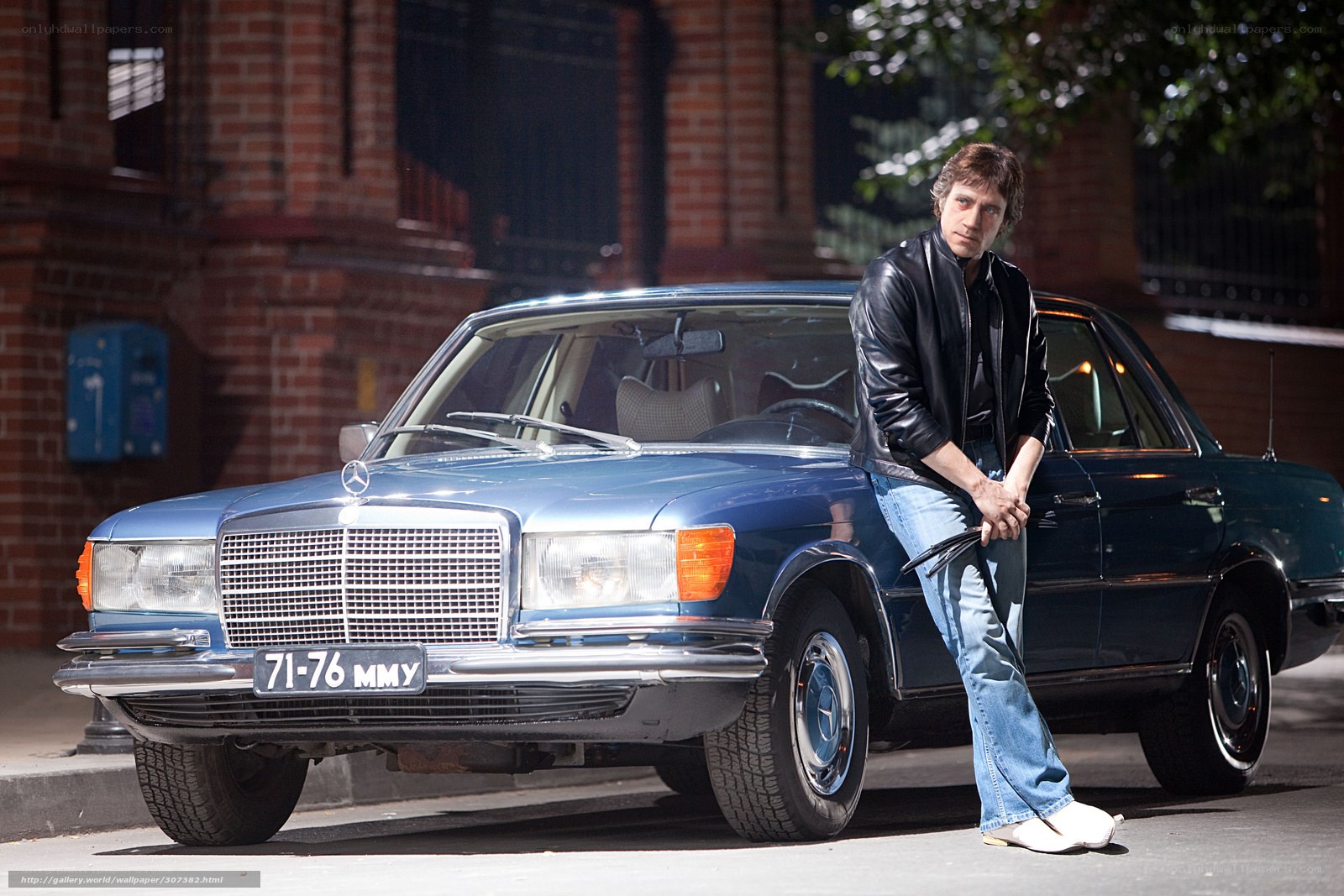 Man with classic car
