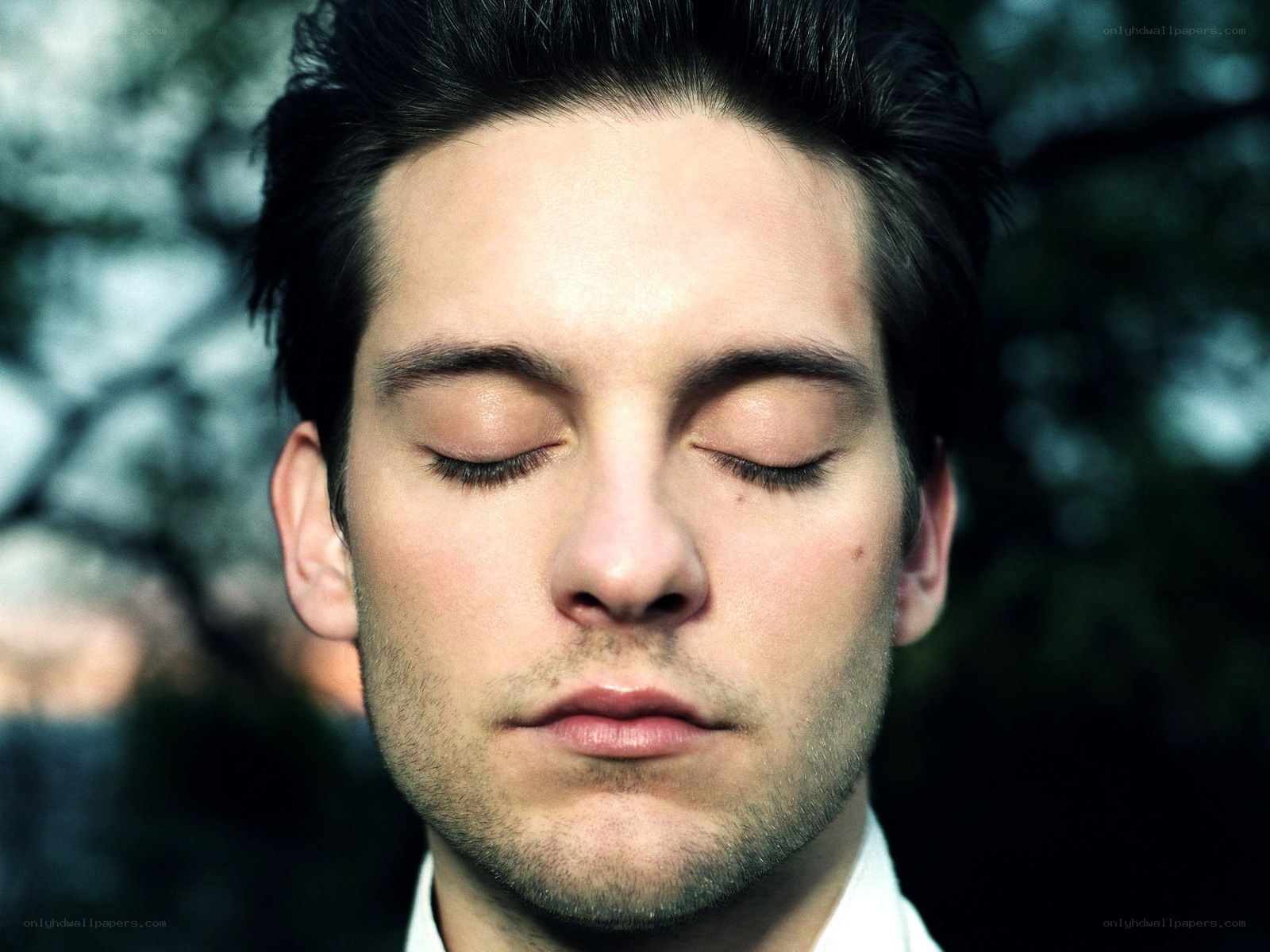 man with closed eyes