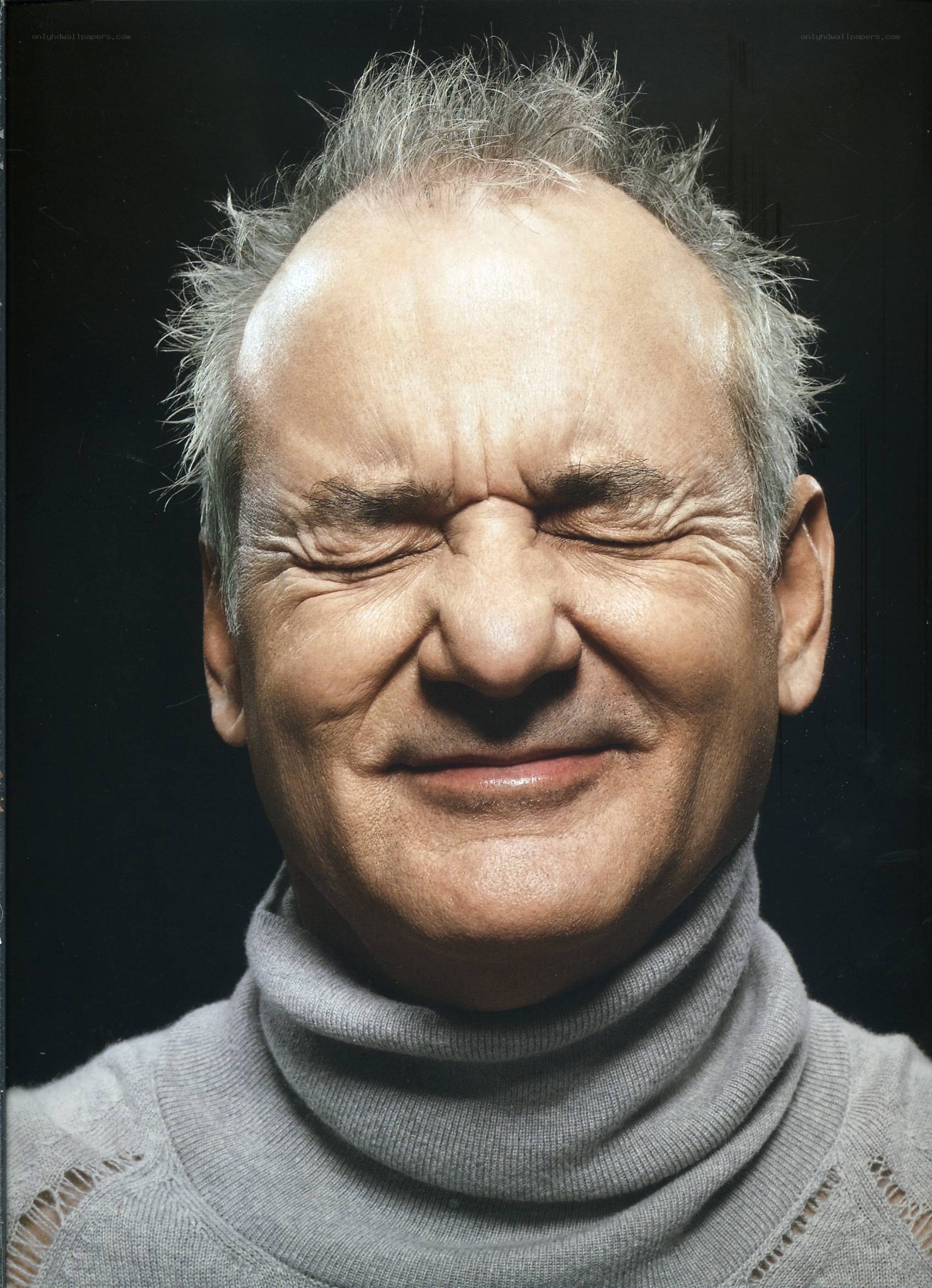 man with closed eyes smiling