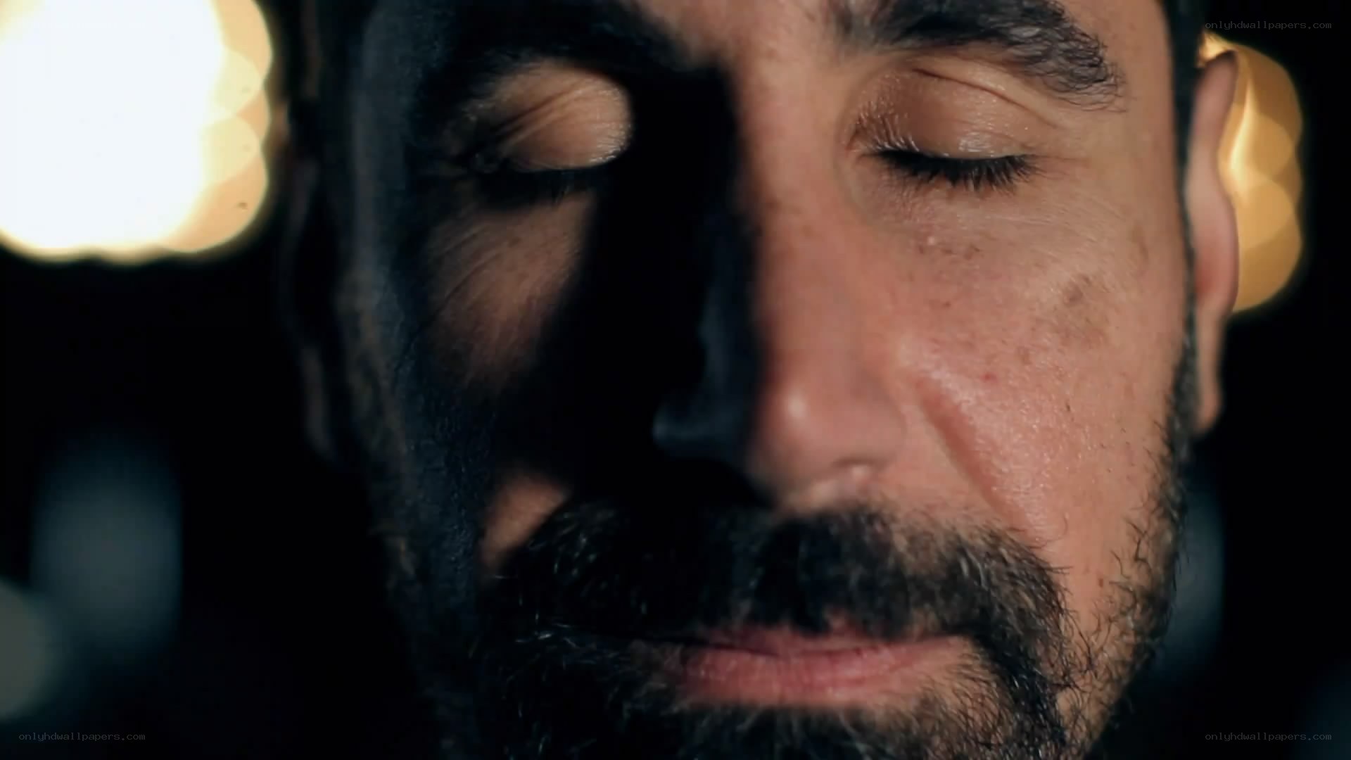 man with closed eyes