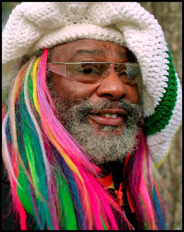 man with colorful dreadlocks