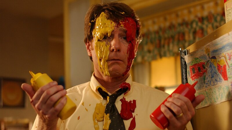 Man with condiments on face
