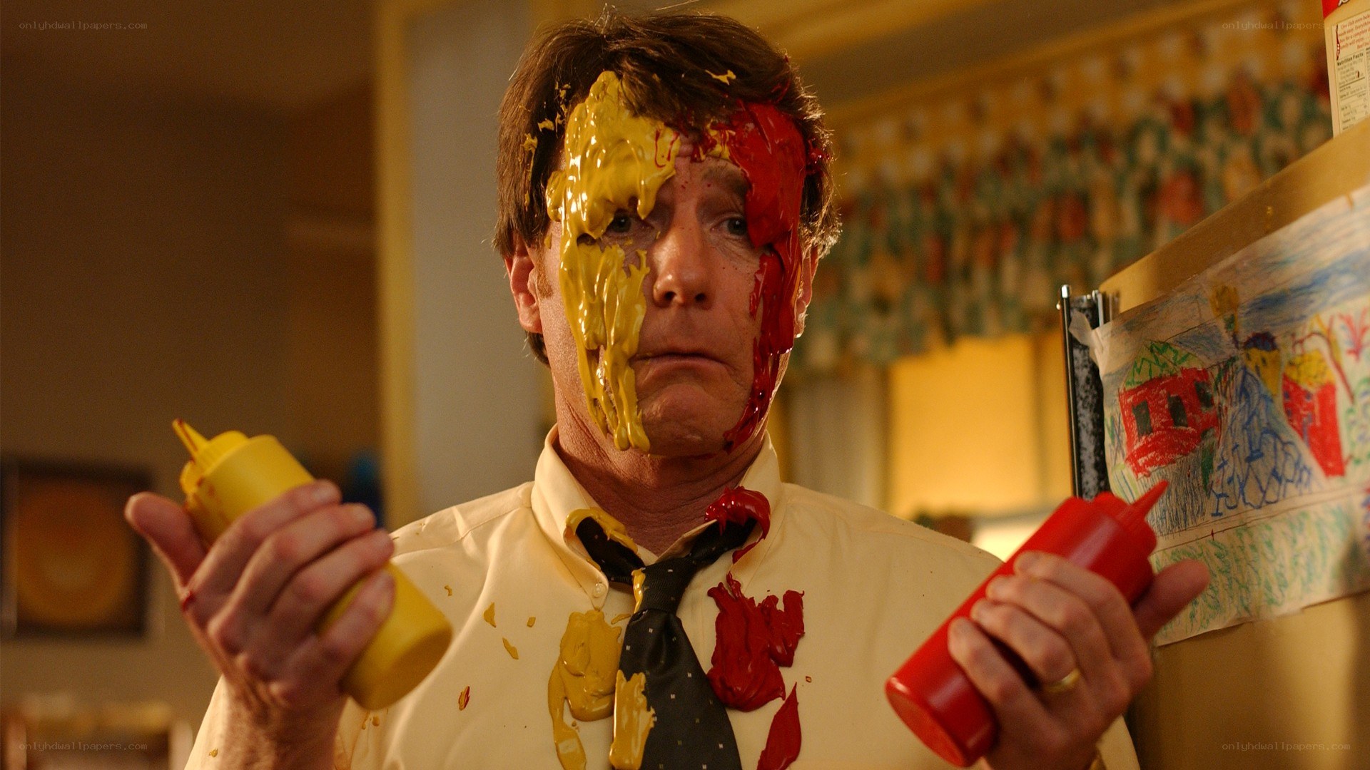 Man with condiments on face