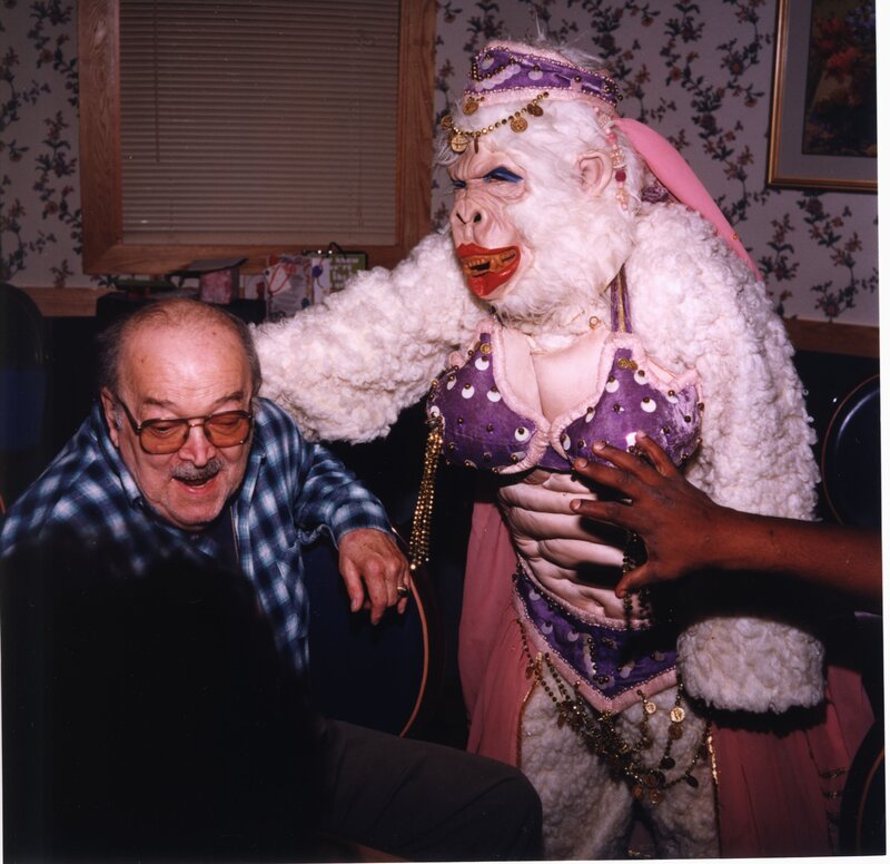 Man with Costumed Gorilla