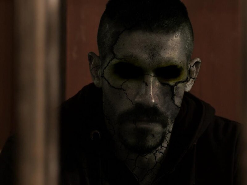Man with Cracked Face — Black, Dramatic