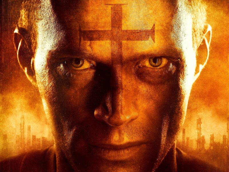 Man with cross on forehead