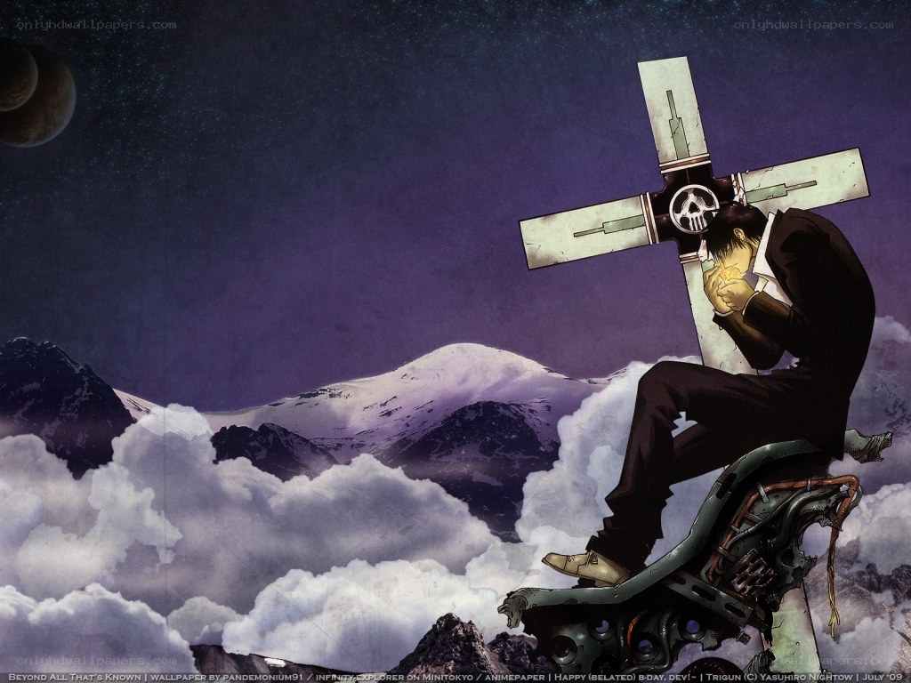 Man with cross on mountain