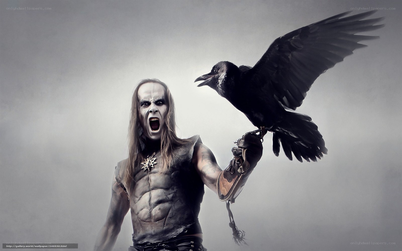 man with crow on arm