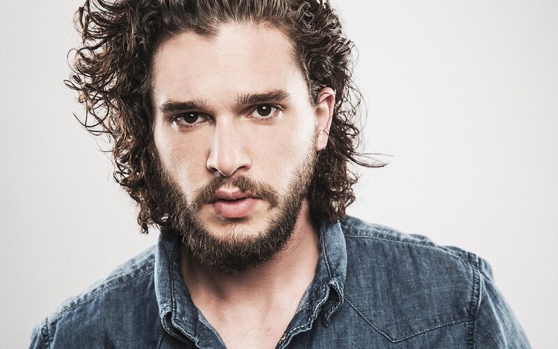 man with curly hair and beard