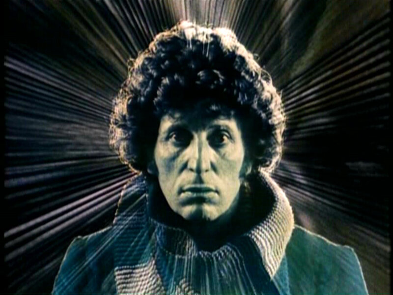 man with curly hair and glowing background