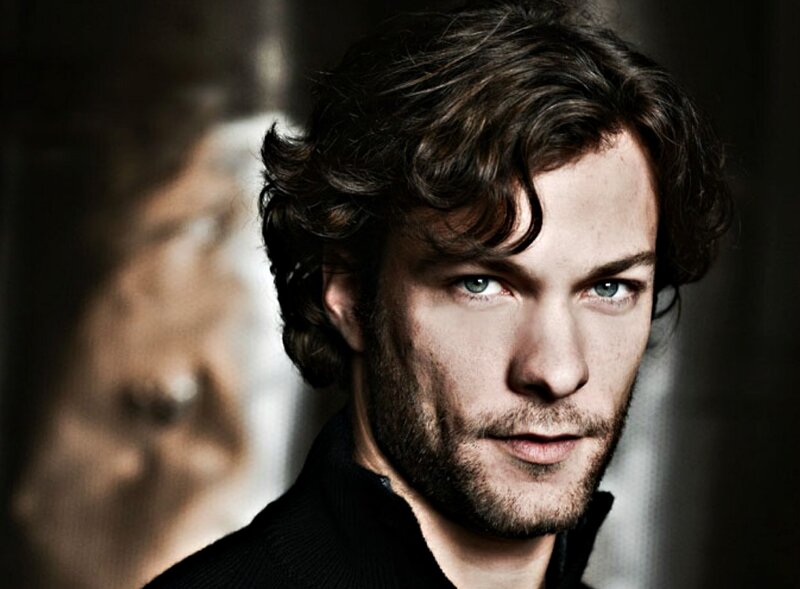 Man with Curly Hair — Black, Dramatic, Photograph, Beard, Black Shirt