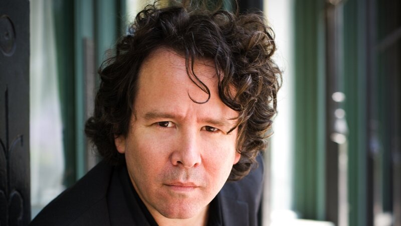 Man with Curly Hair — Black, Serious, Photograph, Black Jacket