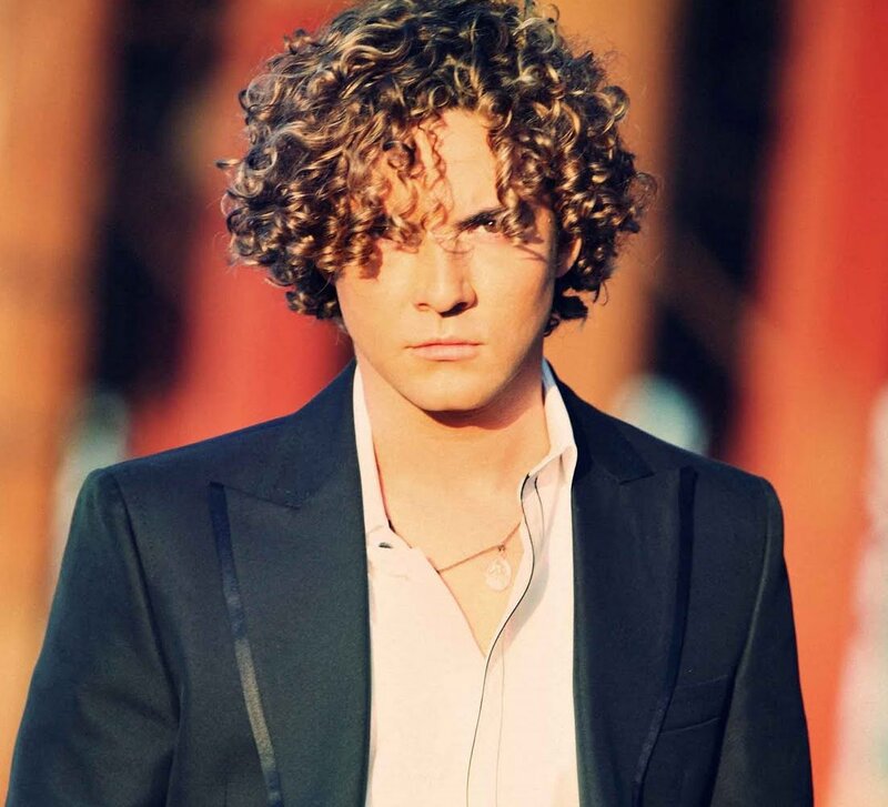 Man with Curly Hair — Black, Serious, Photograph, Suit Jacket