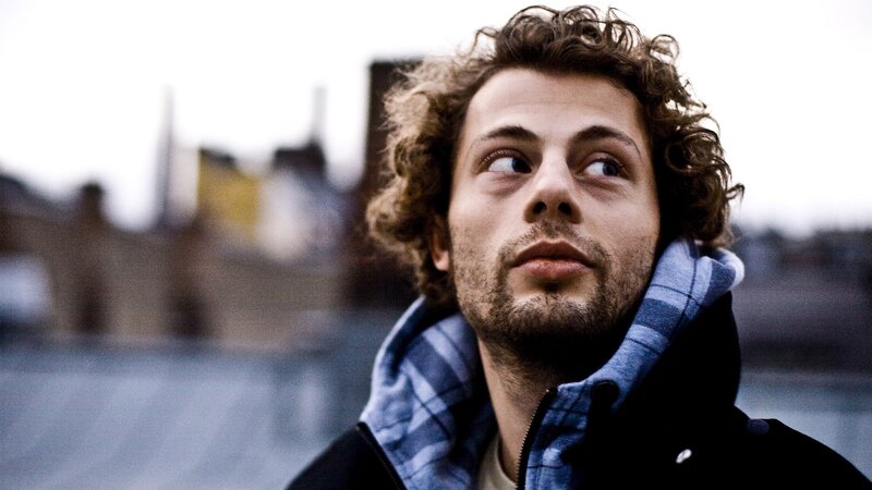 Man with Curly Hair — Blue, Contemplative