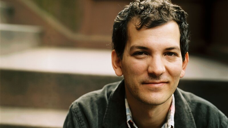 Man with Curly Hair — Brown, Neutral, Photograph, Jacket