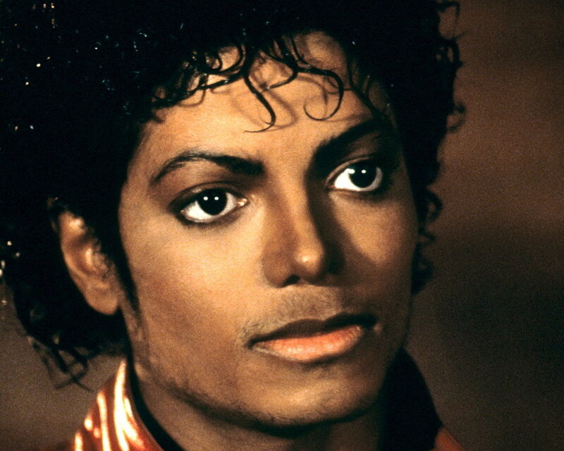 Man with Curly Hair — Brown, Serious