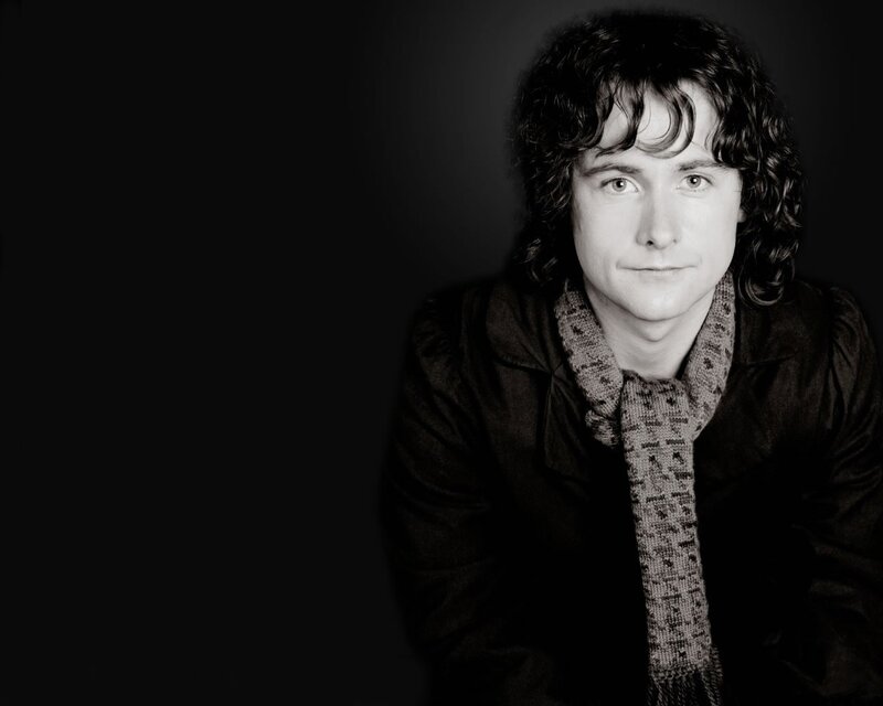 man with curly hair portrait